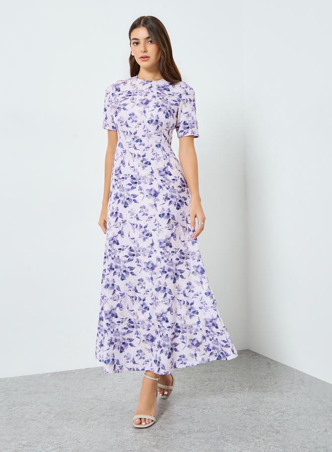 ستايلي فستان طويل مطرز بالزهور - Image 1